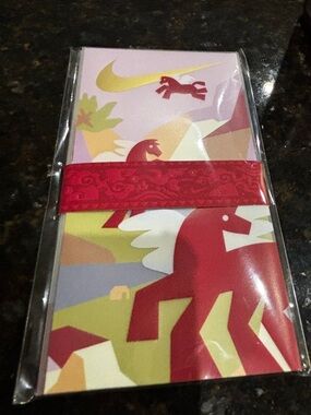 Nike Red and Pink Horse Graphic envelopes with Yellow Swoosh